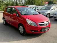 Second-hand Opel Corsa 90 CP (66 kW) 2009 Roșu Hatchback