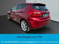Gebraucht Ford Fiesta Titanium 101 PS (74 kW) 2018 Ruby rot (metallic) Kleinwagen