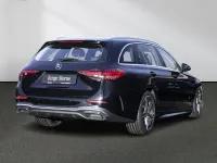 Gebraucht Mercedes C180 AMG 170 PS (125 kW) 2023 Unilack schwarz Kombi