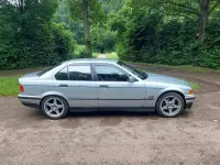 Second-hand BMW 320 150 CP (110 kW) 1994 Argintiu Berlinǎ