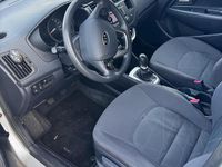 Gebraucht Kia Rio 109 PS (80 kW) 2012 Silber Kleinwagen