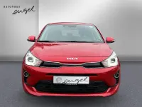 Gebraucht Kia Rio Platinum Edition 120 PS (88 kW) 2023 Signal rot metallic Limousine