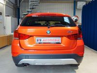 Gebraucht BMW X1 Performance 184 PS (135 kW) 2014 Valencia orange metallic SUV