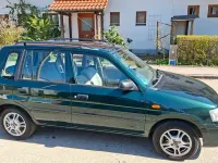 Gebraucht Mazda Demio Exclusive 75 PS (55 kW) 2001 Piniengrün Kleinwagen