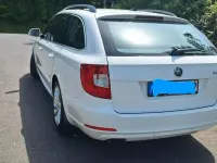 Gebraucht Skoda Superb 105 PS (77 kW) 2011 Weiß Kombi