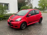 Second-hand Toyota Aygo 68 CP (50 kW) 2009 Roșu Hatchback
