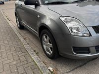Second-hand Suzuki Swift 92 CP (67 kW) 2009 Gri Hatchback