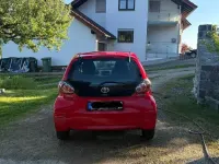 Gebraucht Toyota Aygo 69 PS (50 kW) 2011 Rot Kleinwagen