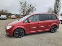 Gebraucht VW Touran Highline 170 PS (125 kW) 2010 Rot metallic Van / Kleinbus