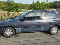 Używany Mazda 323 88 KM (64 kW) 1999 Niebieski Sedan/Limuzyna