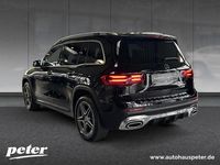 Gebraucht Mercedes GLB180 AMG 136 PS (100 kW) 2024 Metalliclack kosmosschwarz SUV