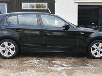 Gebraucht BMW 116 122 PS (89 kW) 2007 Schwarz Kleinwagen