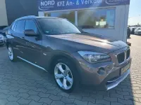 Używany BMW X1 177 KM (130 kW) 2012 Brązowy SUV