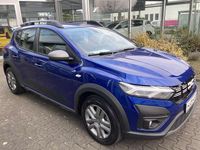 Gebraucht Dacia Sandero Expression 101 PS (74 kW) 2023 Ironblau metallic Limousine