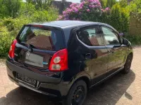 Gebraucht Nissan Pixo Acenta 68 PS (50 kW) 2009 Schwarz Kleinwagen