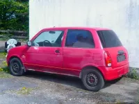 Gebraucht Daihatsu Cuore Plus 56 PS (41 kW) 1998 Rot Kleinwagen