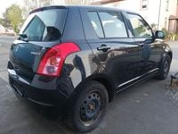 Second-hand Suzuki Swift 92 CP (67 kW) 2009 Negru Hatchback