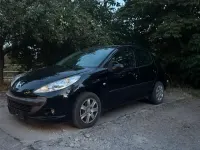 Gebraucht Peugeot 206+ 75 PS (55 kW) 2009 Schwarz Kleinwagen