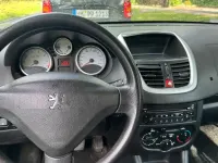 Gebraucht Peugeot 206+ 73 PS (53 kW) 2011 Schwarz Kleinwagen