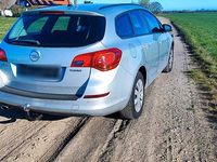 Second-hand Opel Astra 140 CP (102 kW) 2011 Argintiu Break
