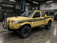 Gebraucht Nissan Navara 103 PS (75 kW) 1999 Gelb Pickup