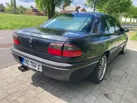 Second-hand Opel Omega 211 CP (155 kW) 1997 Negru Berlinǎ