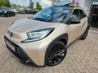 Gebraucht Toyota Aygo X x-style 72 PS (52 kW) 2022 Ginger beige metallic/ night sky black SUV