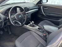 Gebraucht BMW 118 143 PS (105 kW) 2009 Schwarz Kleinwagen