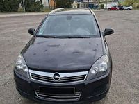 Second-hand Opel Astra 110 CP (80 kW) 2010 Negru Break