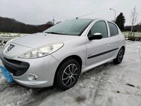 Gebraucht Peugeot 206+ 74 PS (54 kW) 2012 Grau Kleinwagen