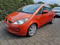 Second-hand Mitsubishi Colt 109 CP (80 kW) 2006 Portocaliu Cabrio