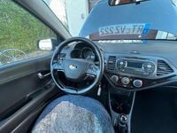 Second-hand Kia Picanto 69 CP (50 kW) 2013 Negru Hatchback