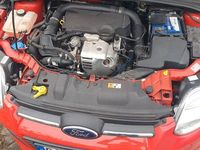 Używany Ford Focus Ambiente 101 KM (74 kW) 2014 Czerwony Sedan/Limuzyna