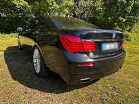 Second-hand BMW 730L 245 CP (180 kW) 2011 Negru Berlinǎ