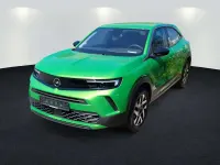 Gebraucht Opel Mokka Elegance 131 PS (96 kW) 2024 Lackierung matcha green/typ aussenverkle (metallic) SUV