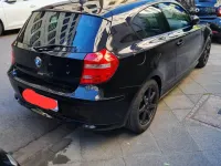 Gebraucht BMW 116 122 PS (89 kW) 2008 Schwarz Kleinwagen