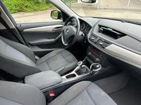 Second-hand BMW X1 143 CP (105 kW) 2014 Negru SUV