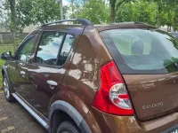 Gebraucht Dacia Sandero Stepway 84 PS (61 kW) 2012 Braun Limousine