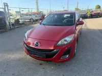 Używany Mazda 3 Prime-Line 105 KM (77 kW) 2011 Czerwony Hatchback