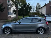 Gebraucht BMW 116 122 PS (89 kW) 2010 Grau Kleinwagen