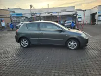 Używany Toyota Corolla 110 KM (80 kW) 2004 Szary Hatchback