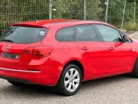 Gebraucht Opel Astra 110 PS (80 kW) 2012 Rot Kombi