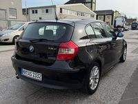 Gebraucht BMW 118 122 PS (89 kW) 2007 Schwarz Kleinwagen
