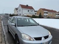 Second-hand Mitsubishi Lancer 98 CP (72 kW) 2007 Argintiu Berlinǎ