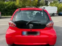 Gebraucht Toyota Aygo 68 PS (50 kW) 2010 Rot Kleinwagen