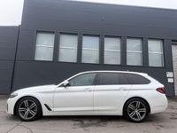 Gebraucht BMW 520 Performance 190 PS (139 kW) 2022 Mineralweiss metallic Kombi