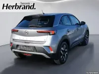 Gebraucht Opel Mokka-e Elegance 100 kW (136 PS) 2022 Kontrast grau/quarz silber SUV