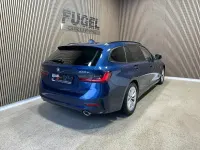Gebraucht BMW 330e Advantage 2022 Phytonicblau metallic Kombi