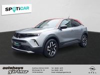 Gebraucht Opel Mokka-e Elegance 100 kW (136 PS) 2022 Kontrast grau/quarz silber SUV