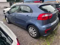 Gebraucht Kia Rio Attract 90 PS (66 kW) 2016 (eu2) urban blue Kleinwagen